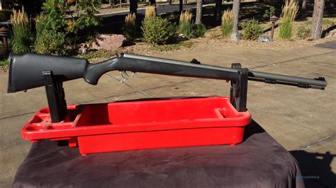 thompson center omega muzzleloader used price|thompson center omega stock.